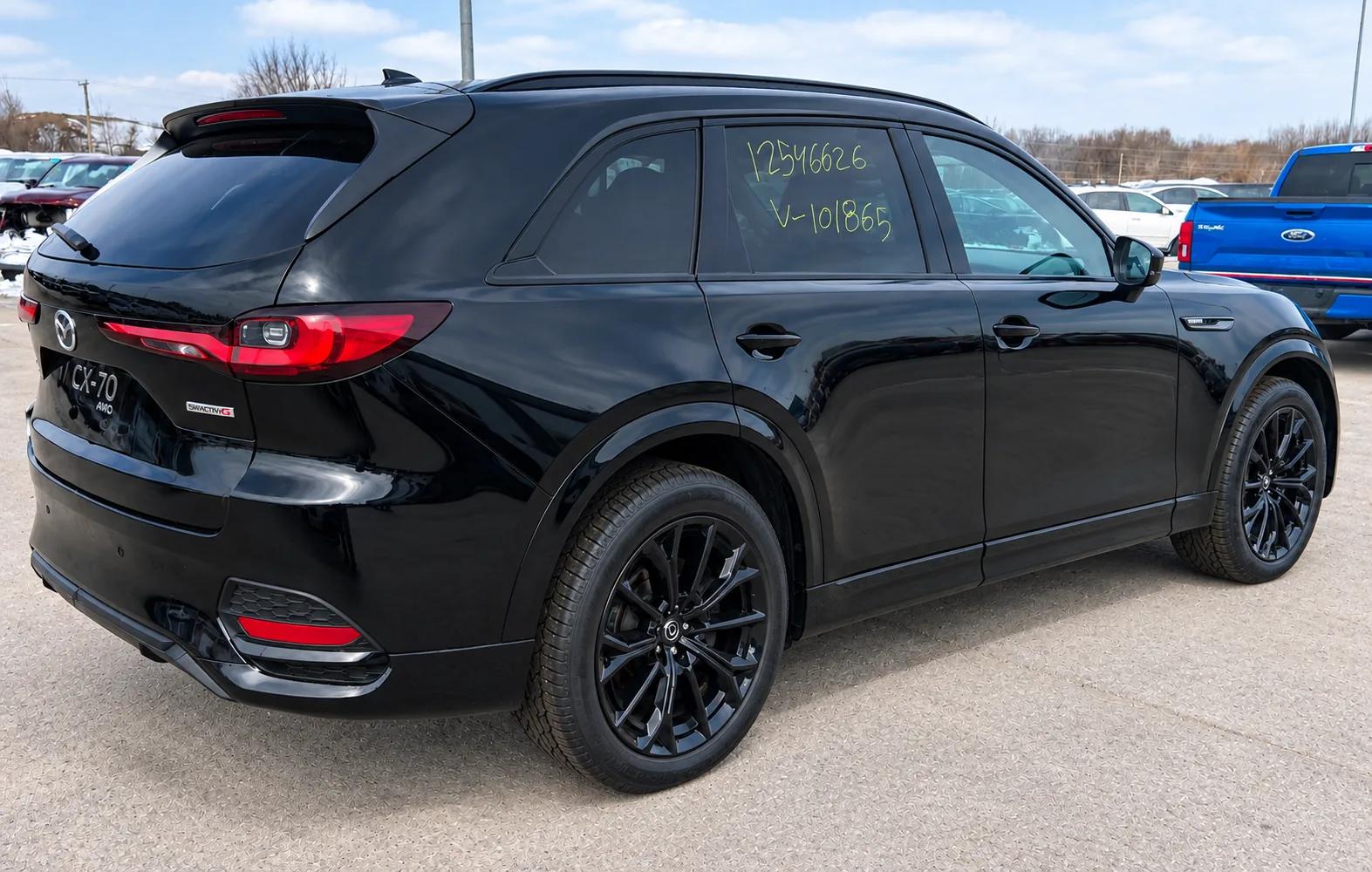 Mazda CX-70 2025 vue arrière trois quarts